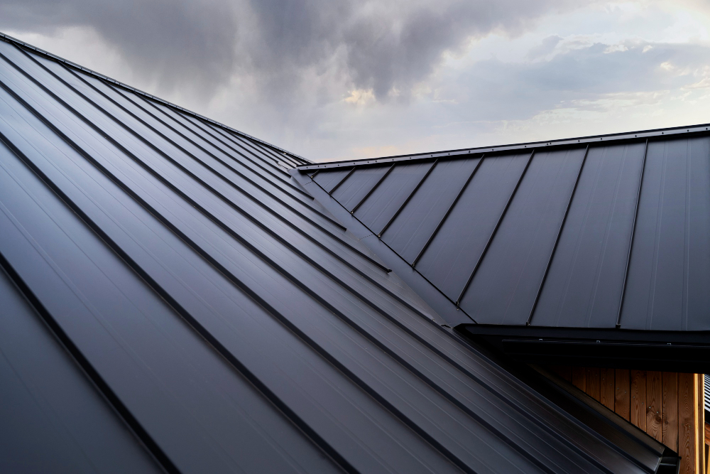 Modern metal roof design with a stormy sky background